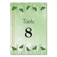 Green butterfly on light green -  table number