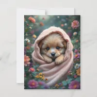 Cute, tiny, fluffy puppy surrounded by flowers postcard