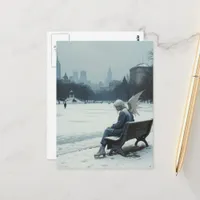 Sad angel in ice skates sitting on a park bench postcard