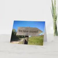 We have moved wooden sign announcement