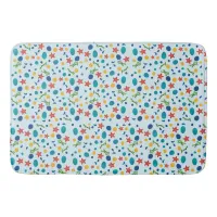 Ocean beach with starfish, shells and pebbles bath mat