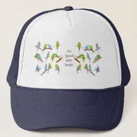 Lots of colorful parakeets - fun little birds  trucker hat