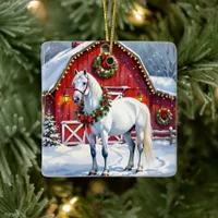 A Festive White Horse and Winter Barn Christmas Ceramic Ornament