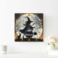 A witch brews potions under a glowing full moon square wall clock