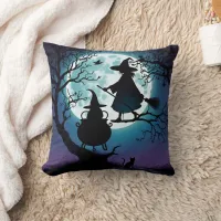 Witch flying at night under a full moon throw pillow