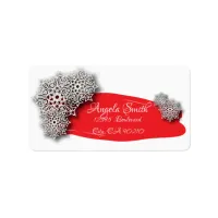 Christmas White Paper Cut Snowflakes On A Red Label