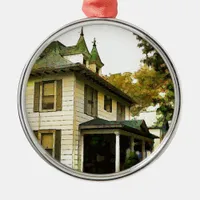 A lovely house metal ornament