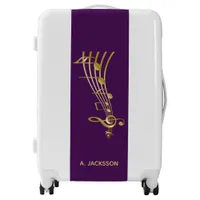 Faux gold music notes on chic purple suitcase