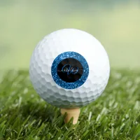 Stylish monogram name blue sparkling glitter golf balls