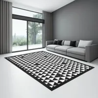 Black, white, and gray geometric triangle pattern rug