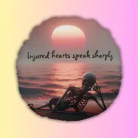 Injured hearts speak sharply | round pillow