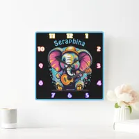 Joyful elephant strumming a guitar square wall clock