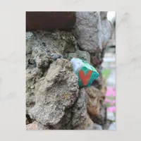 Green Gold Heart Painted Heart Rock on Rock Wall  Postcard