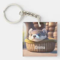 Cute otter baby in a basket - personalizable keychain