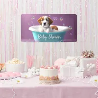 Cute puppy in a bathtub with bubbles, baby shower banner