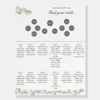 Finely flourished wedding seating chart round tabl foam board