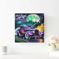 Hot rod races down moonlit mountain road square wall clock