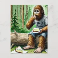 Sasquatch in mossy forest with yummy cheesecake postcard