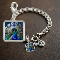 Gorgeous peacock with teal and gold plumage charm