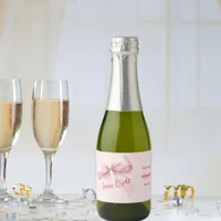 She's tying the knot pink bow Team Bride Sparkling Wine Label