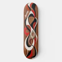 Flowing abstract black, red, white on walnut skateboard