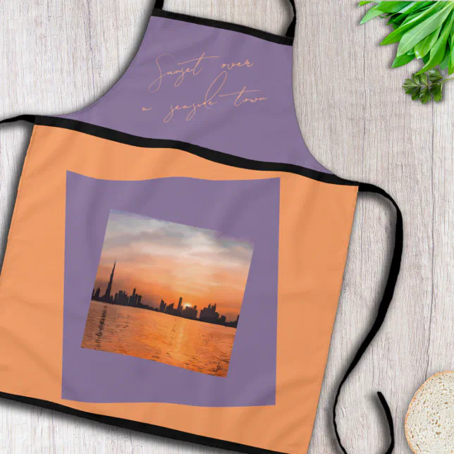 Sunset over a seaside town - Art Apron