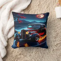 Flames and moonlight dance over a classic hot rod throw pillow